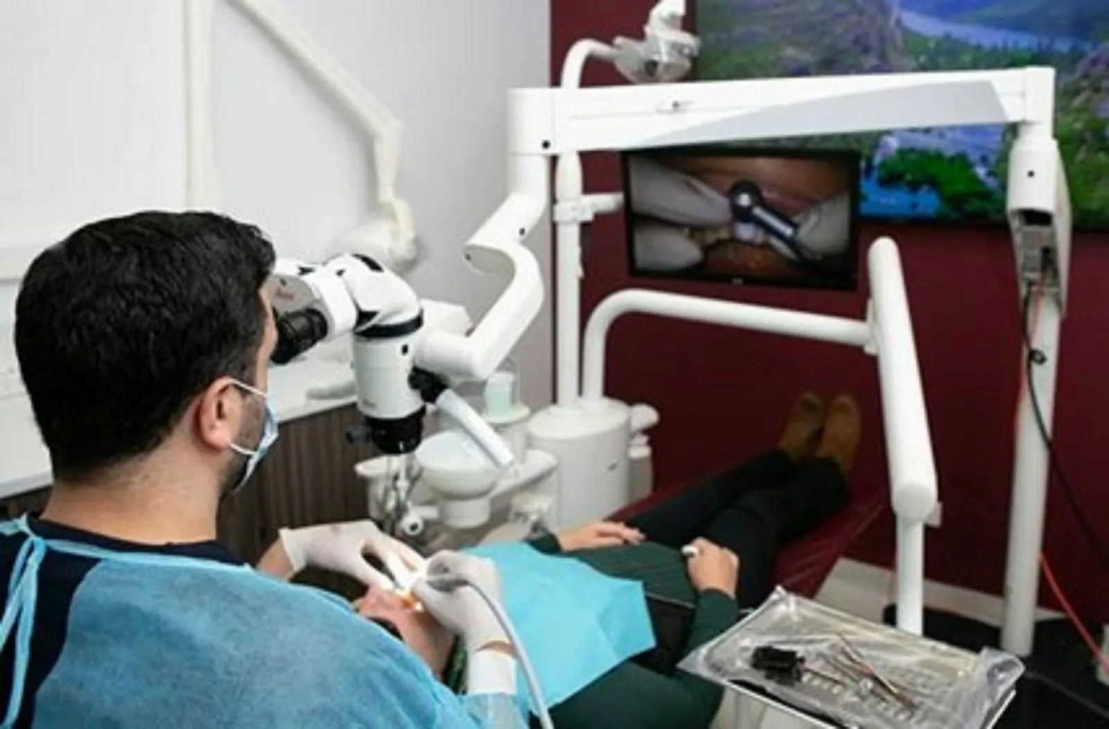 Treatment under a dental microscope